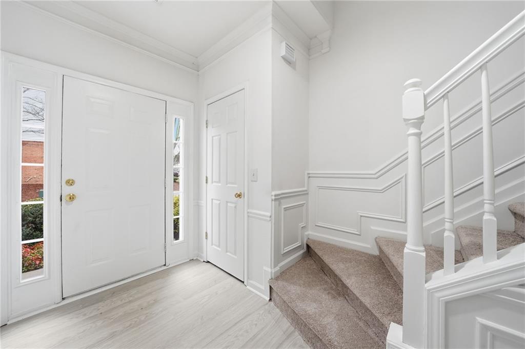 3349 Lathenview Court Alpharetta, GA 30004 - Photo 3 of 48 an entryway with a white walls