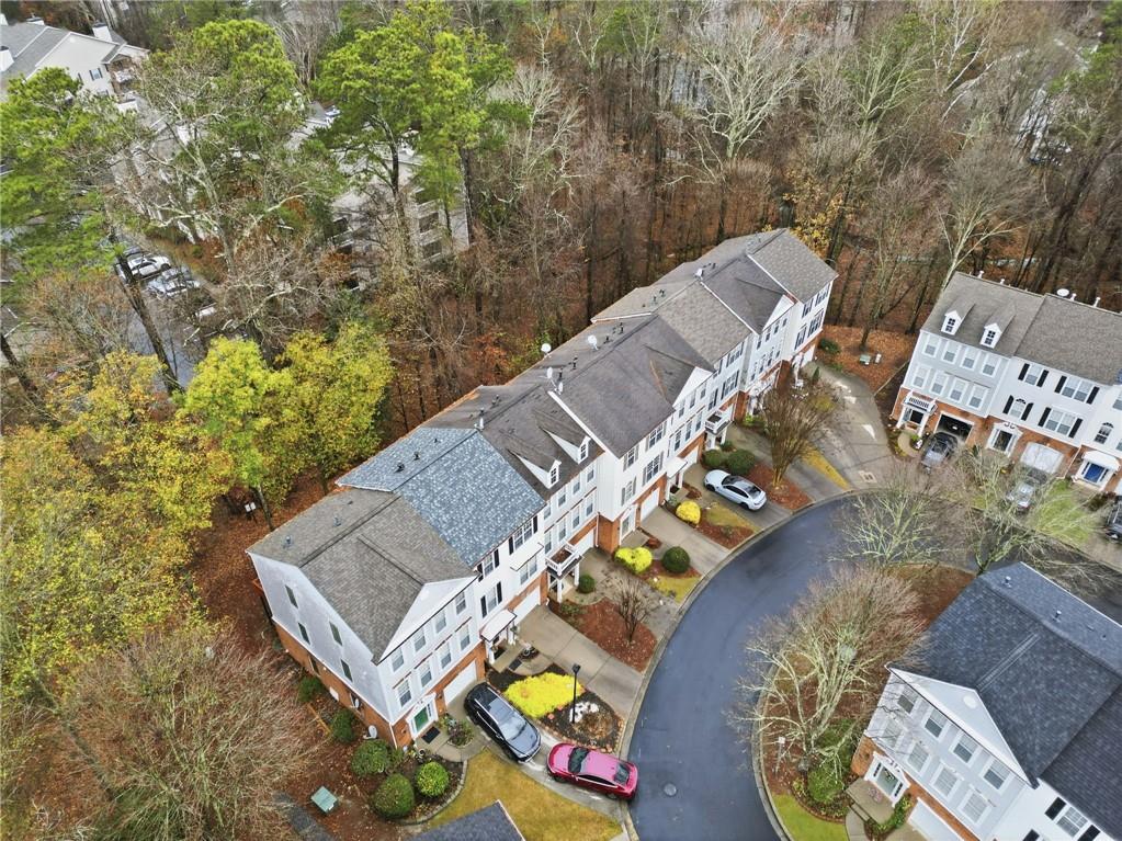 3349 Lathenview Court Alpharetta, GA 30004 - Photo 36 of 48 an aerial view of a house with swimming pool and outdoor seating