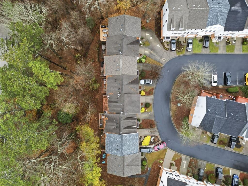 3349 Lathenview Court Alpharetta, GA 30004 - Photo 38 of 48 an aerial view of a house with a swimming pool
