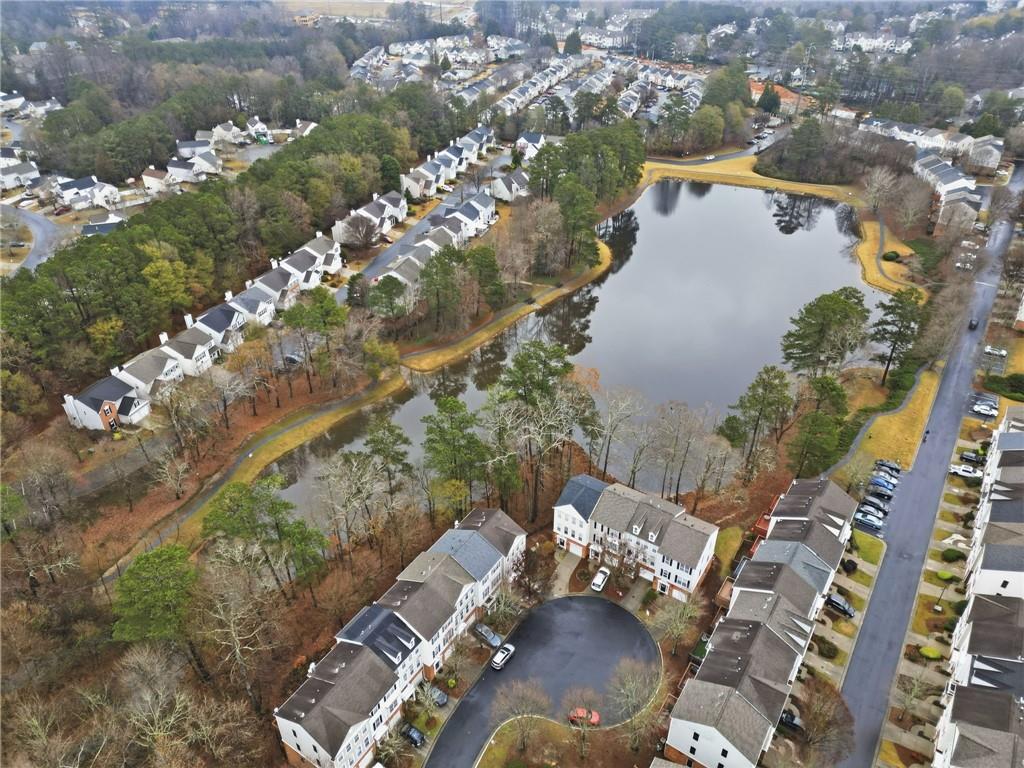 3349 Lathenview Court Alpharetta, GA 30004 - Photo 40 of 48 an aerial view of a house with a yard and lake view