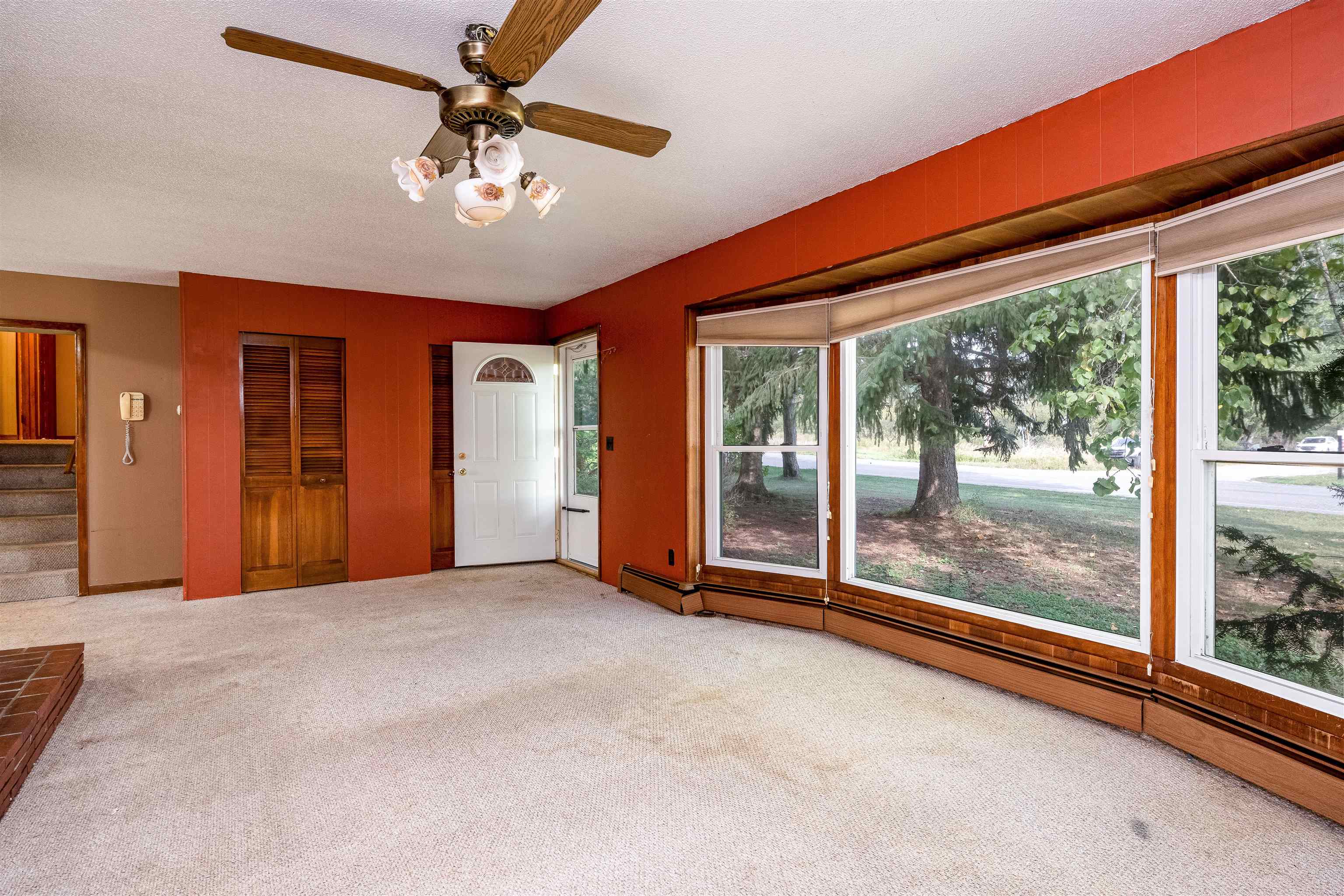 1002 South Herman Road Suttons Bay, MI 49682 - Photo 9 of 28 Spacious open main floor - wall to wall windows