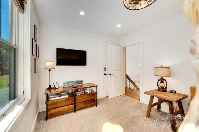 a bathroom with double vanity sinks and a mirror