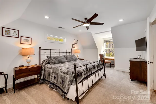 a view of a patio with table and chairs