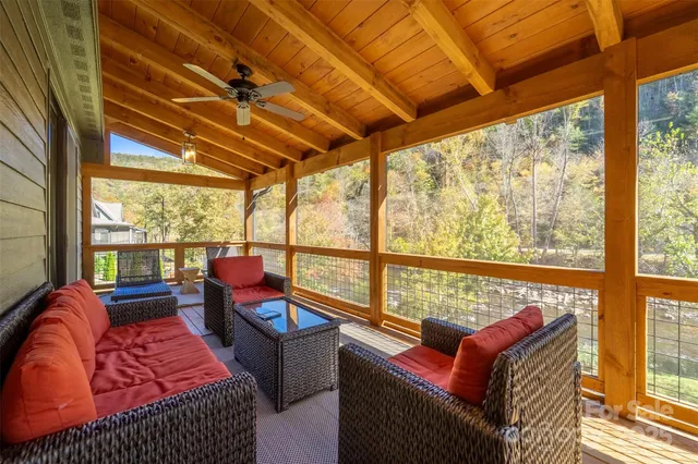 a view of a large window with wooden floor