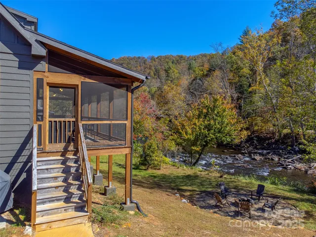 a backyard of a house with wooden fence