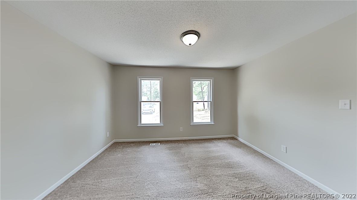 1759 Rim Road Fayetteville, NC 28314 - Photo 7 of 15 an empty room with windows