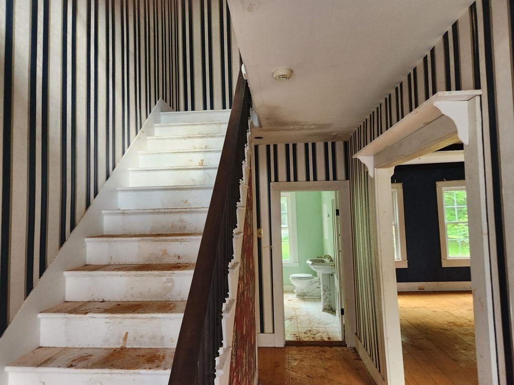 48 Main Street Wales, MA 01081 - Photo 14 of 42 a view of staircase with wooden floor and a view of staircase