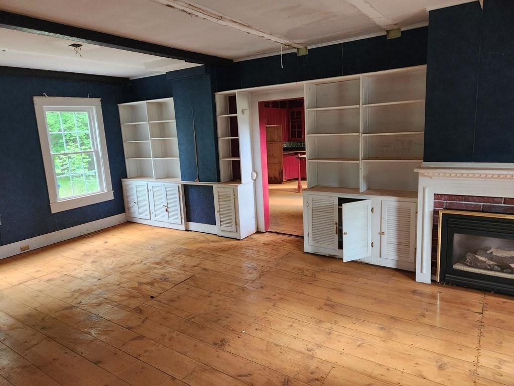 48 Main Street Wales, MA 01081 - Photo 15 of 42 a view of a livingroom with furniture and window