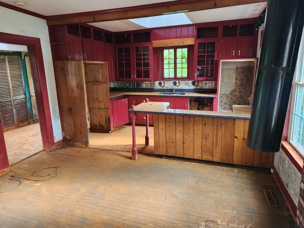 48 Main Street Wales, MA 01081 - Photo 17 of 42 a view of kitchen with refrigerator and window