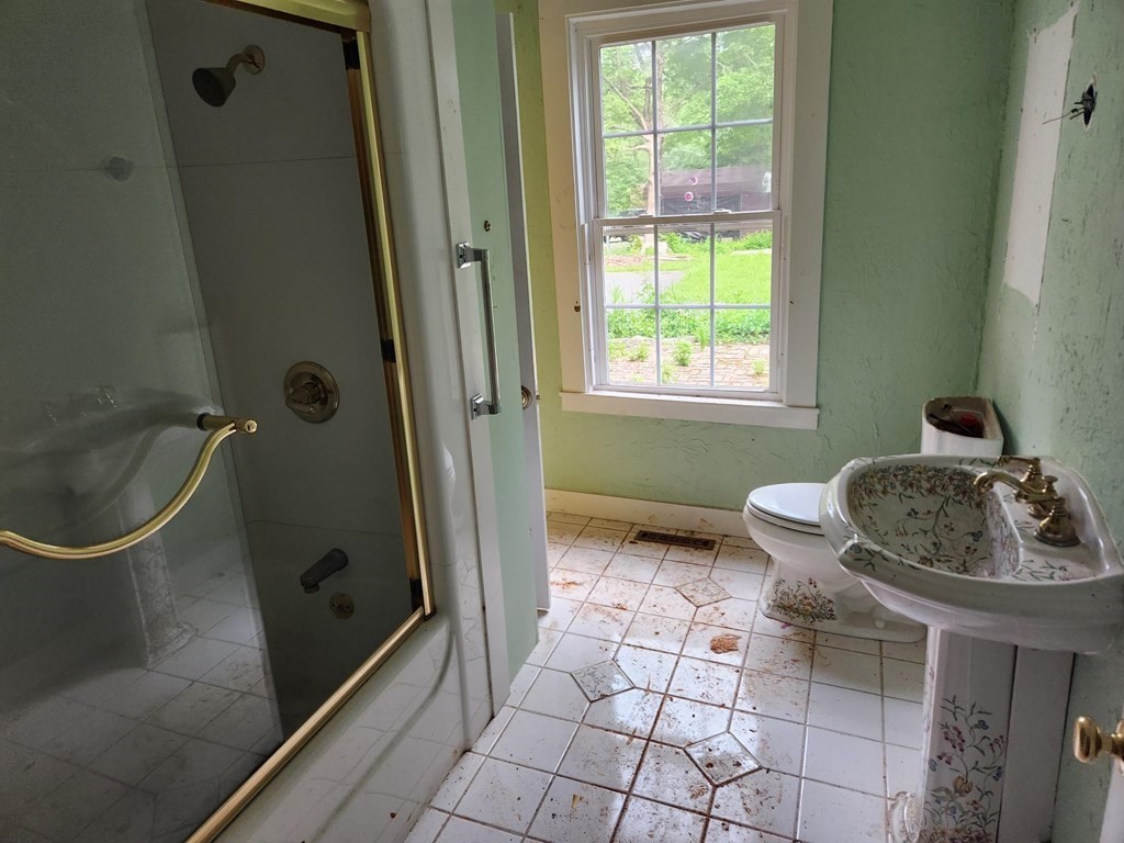 48 Main Street Wales, MA 01081 - Photo 20 of 42 a bathroom with a sink toilet and shower