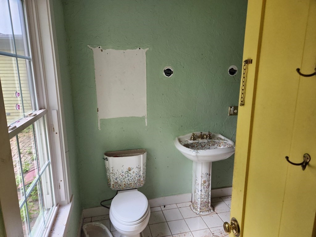 48 Main Street Wales, MA 01081 - Photo 23 of 42 a bathroom with a sink and a toilet