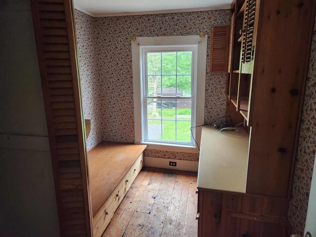 48 Main Street Wales, MA 01081 - Photo 25 of 42 a bathroom with a tub sink and window