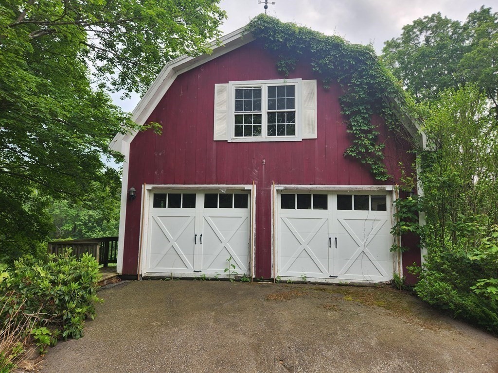 48 Main Street Wales, MA 01081 - Photo 34 of 42 a front view of a house with a garden
