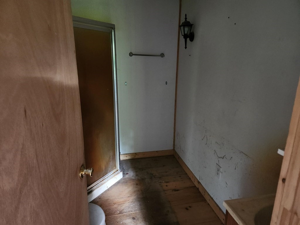 48 Main Street Wales, MA 01081 - Photo 35 of 42 an empty room with wooden floor