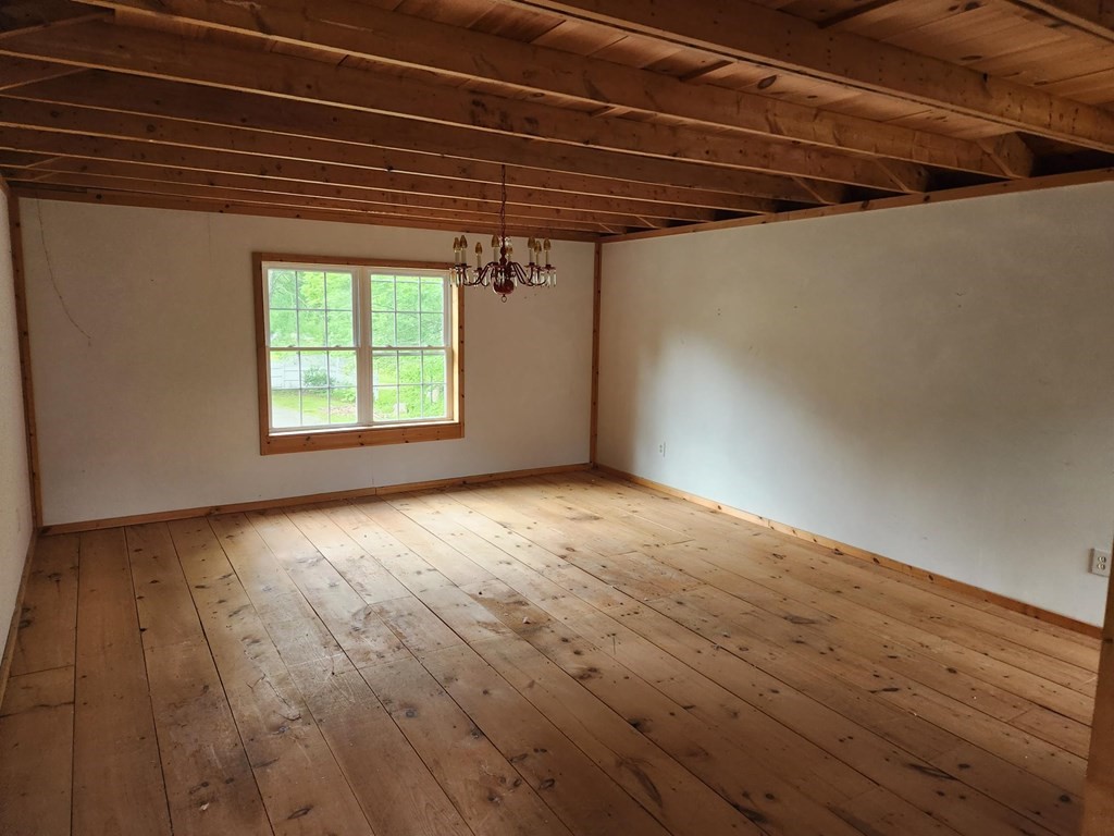 48 Main Street Wales, MA 01081 - Photo 38 of 42 an empty room with windows