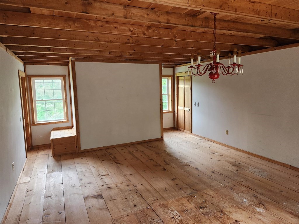 48 Main Street Wales, MA 01081 - Photo 39 of 42 a view of a room with wooden floor and windows
