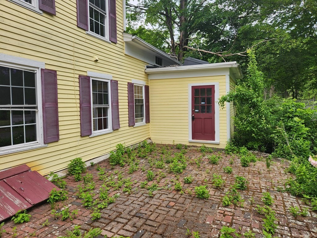 48 Main Street Wales, MA 01081 - Photo 6 of 42 a view of a house with a yard