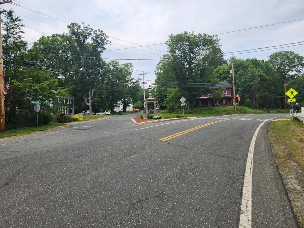 48 Main Street Wales, MA 01081 - Photo 9 of 42 a view of a road with a houses