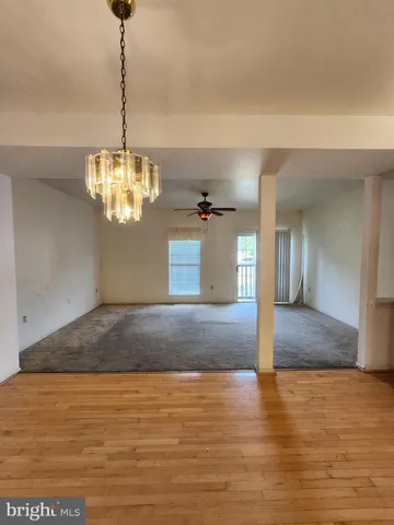 a view of a room with a chandelier