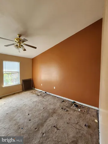 a view of storage and utility room with racks on the wall