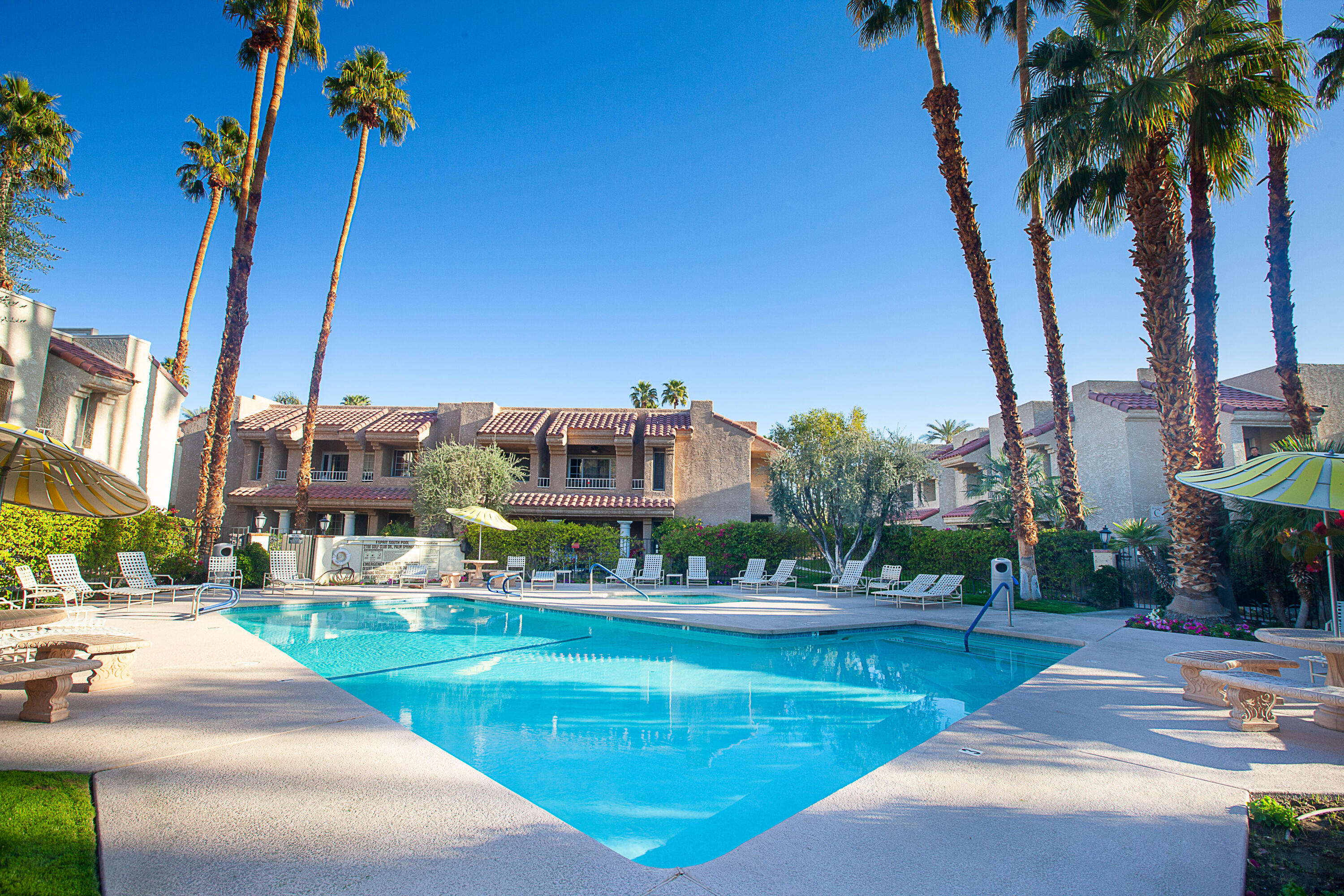 2700 Lawrence Crossley Road, Unit 27 Palm Springs, CA 92264 - Photo 13 of 13 a view of a water fountain and a building in the background