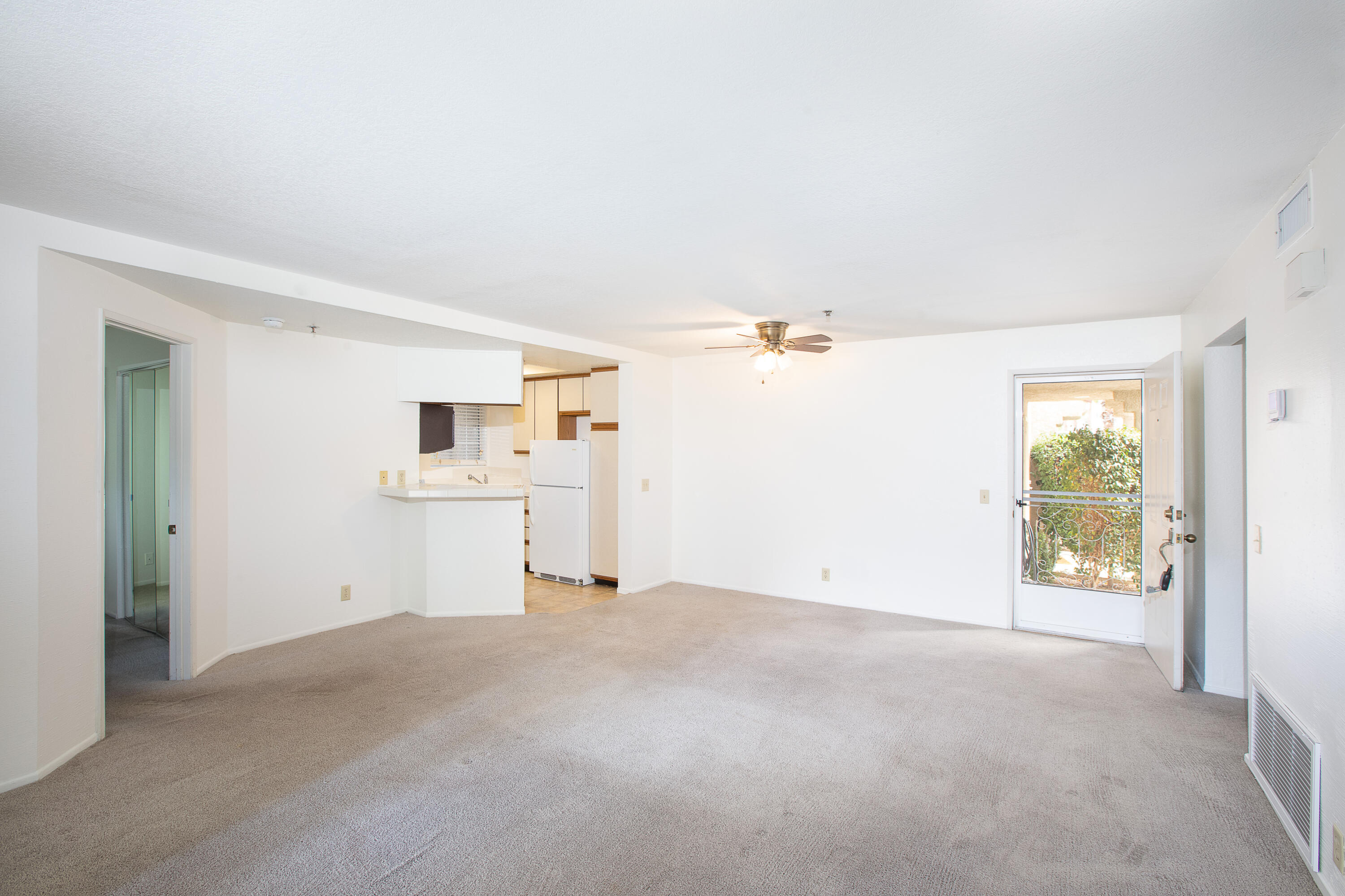 2700 Lawrence Crossley Road, Unit 27 Palm Springs, CA 92264 - Photo 5 of 13 a view of a kitchen with a sink and a window