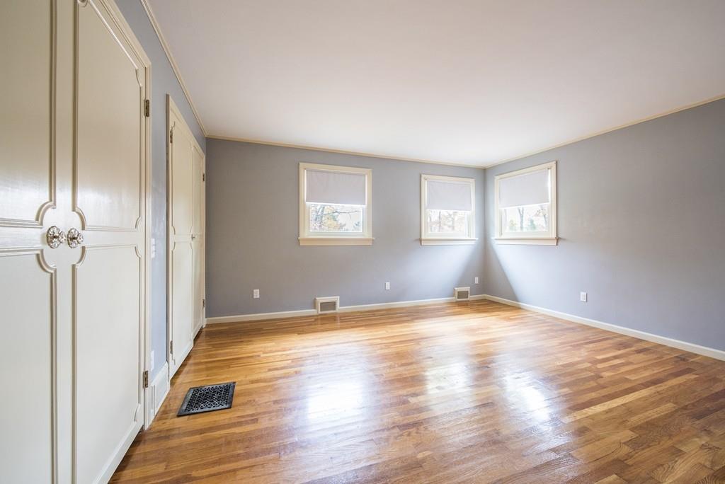 58 Old Gilbertville Road Ware, MA 01082 - Photo 17 of 32 a view of empty room with wooden floor and fan