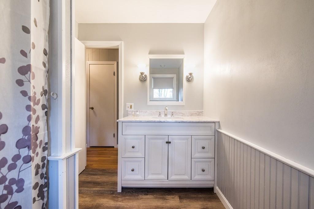 58 Old Gilbertville Road Ware, MA 01082 - Photo 21 of 32 a bathroom with a sink a vanity and a mirror