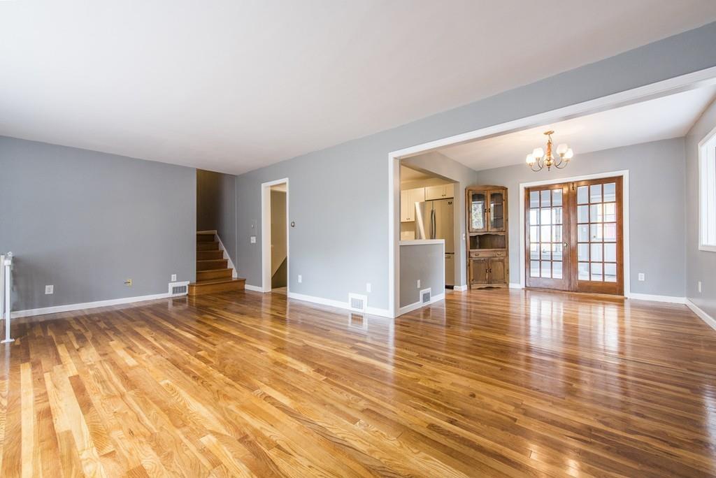 58 Old Gilbertville Road Ware, MA 01082 - Photo 6 of 32 an empty room with wooden floor and windows