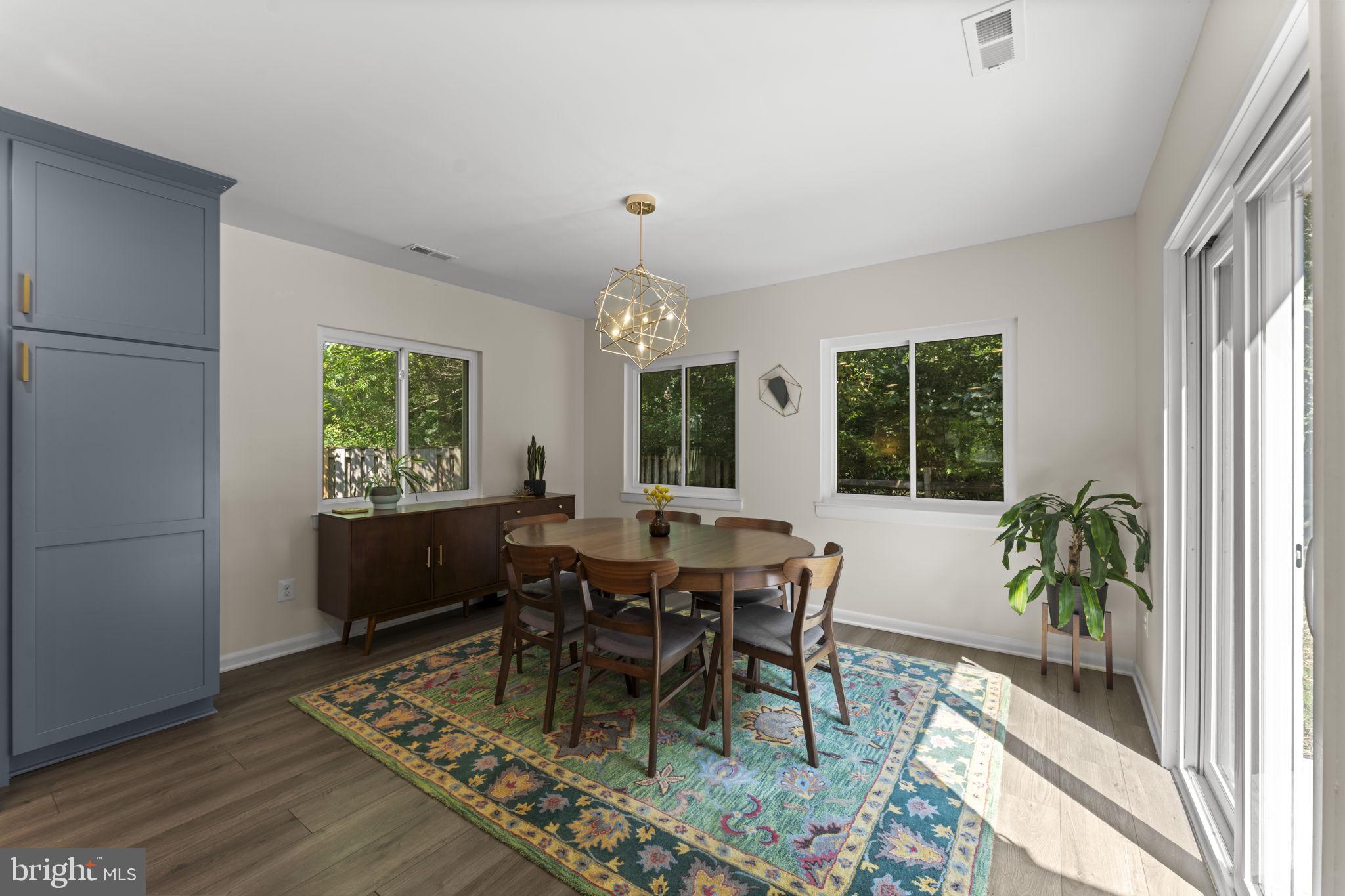 11308 Gatesborough Lane Reston, VA 20191 - Photo 12 of 58 a view of a dining room with furniture window and outside view