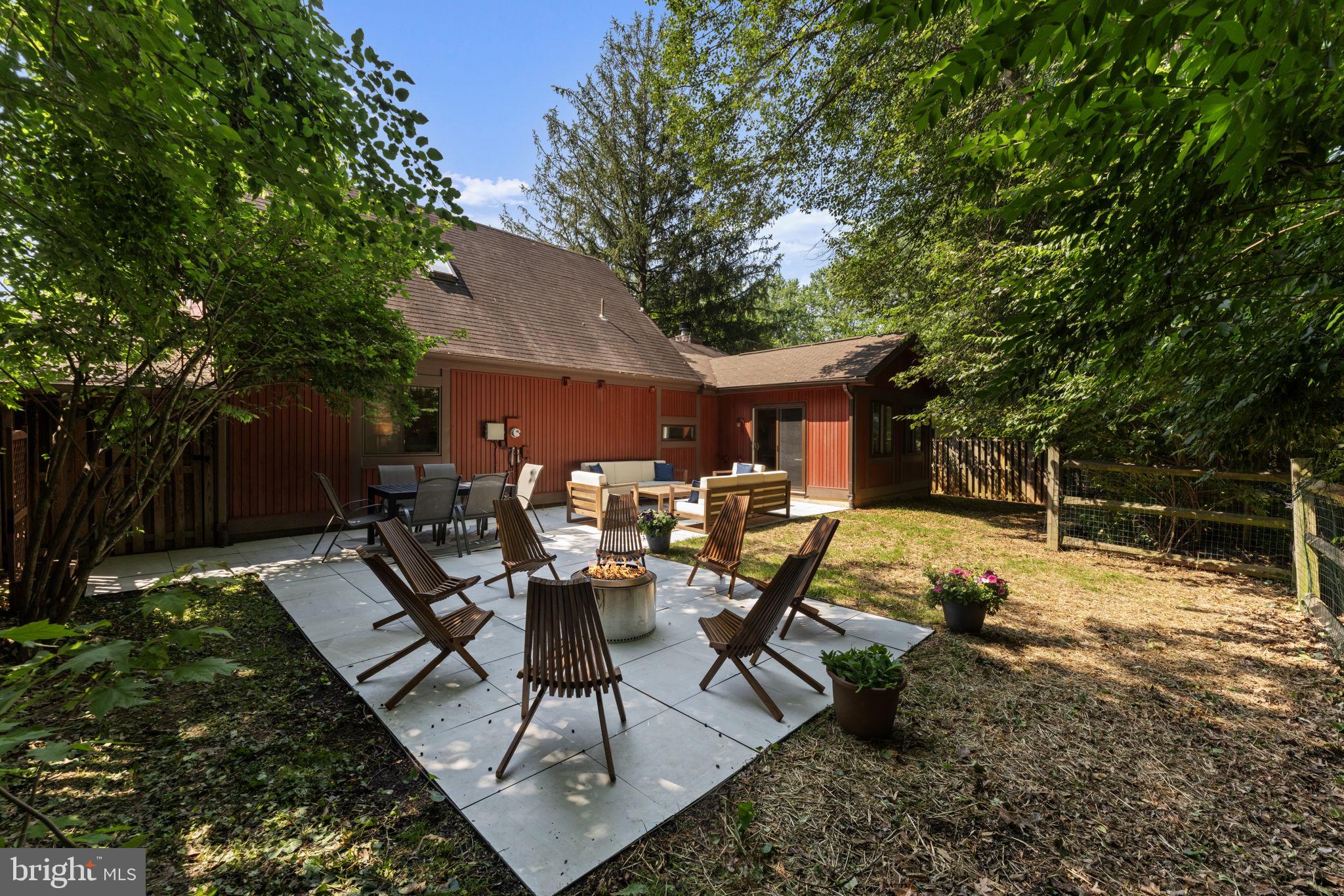 11308 Gatesborough Lane Reston, VA 20191 - Photo 15 of 58 a view of a backyard with sitting area