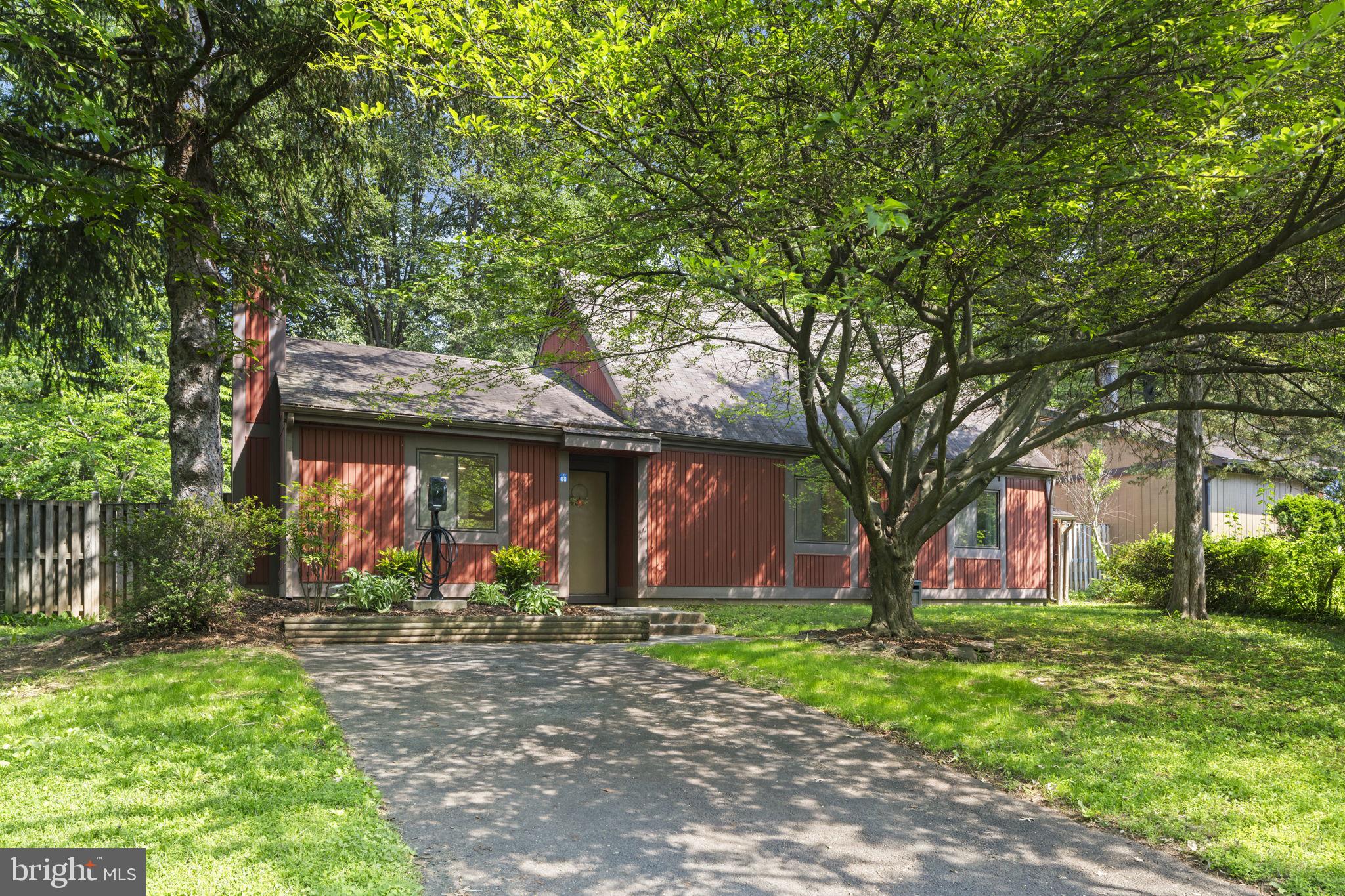 11308 Gatesborough Lane Reston, VA 20191 - Photo 2 of 58 a view of a house with a tree and a yard