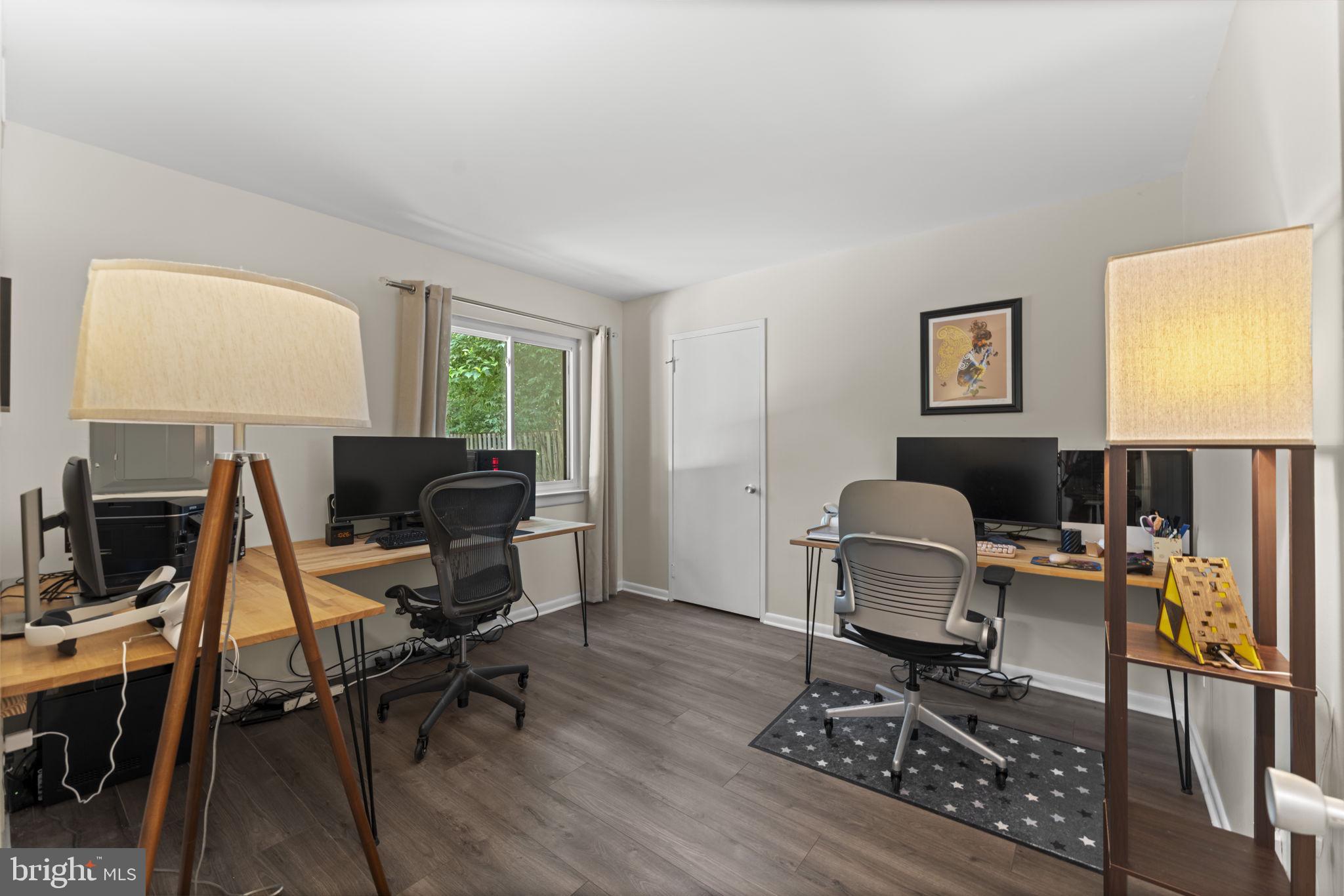 11308 Gatesborough Lane Reston, VA 20191 - Photo 22 of 58 a view of a workspace with furniture and a window