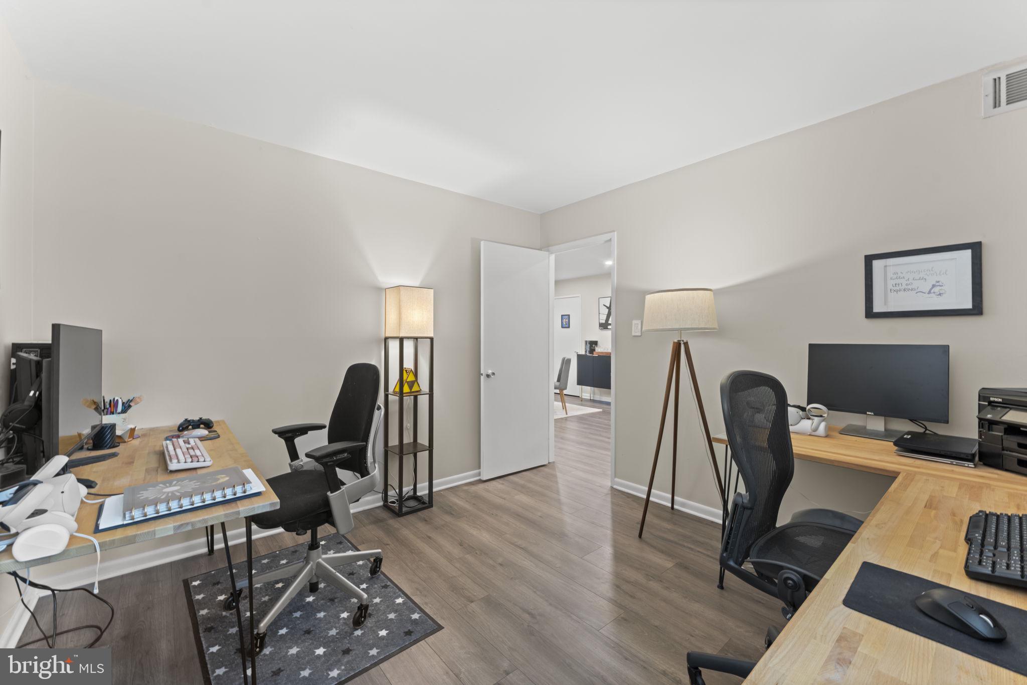 11308 Gatesborough Lane Reston, VA 20191 - Photo 23 of 58 a view of a workspace with furniture and a window