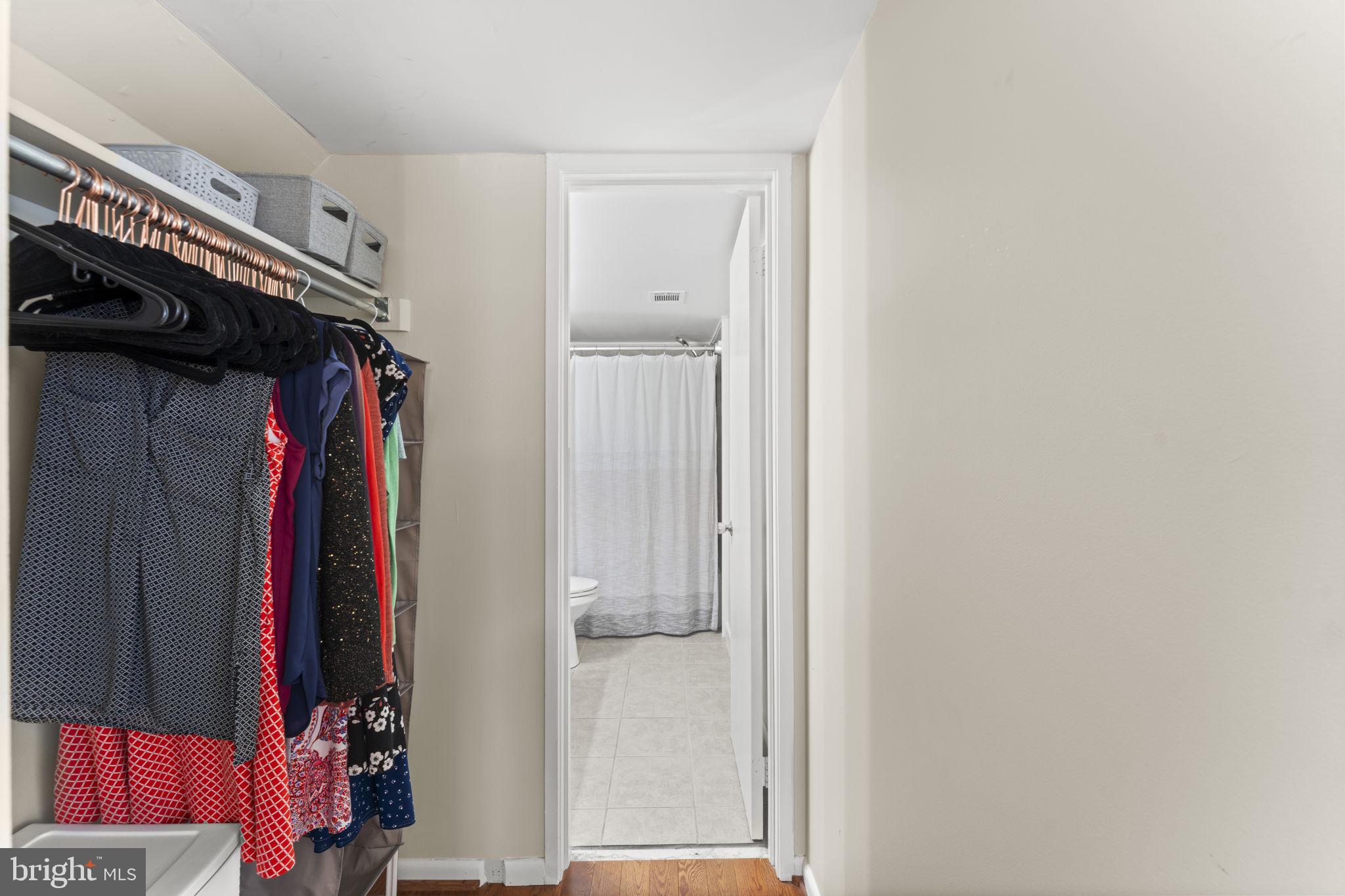 11308 Gatesborough Lane Reston, VA 20191 - Photo 32 of 58 a view of walk in closet