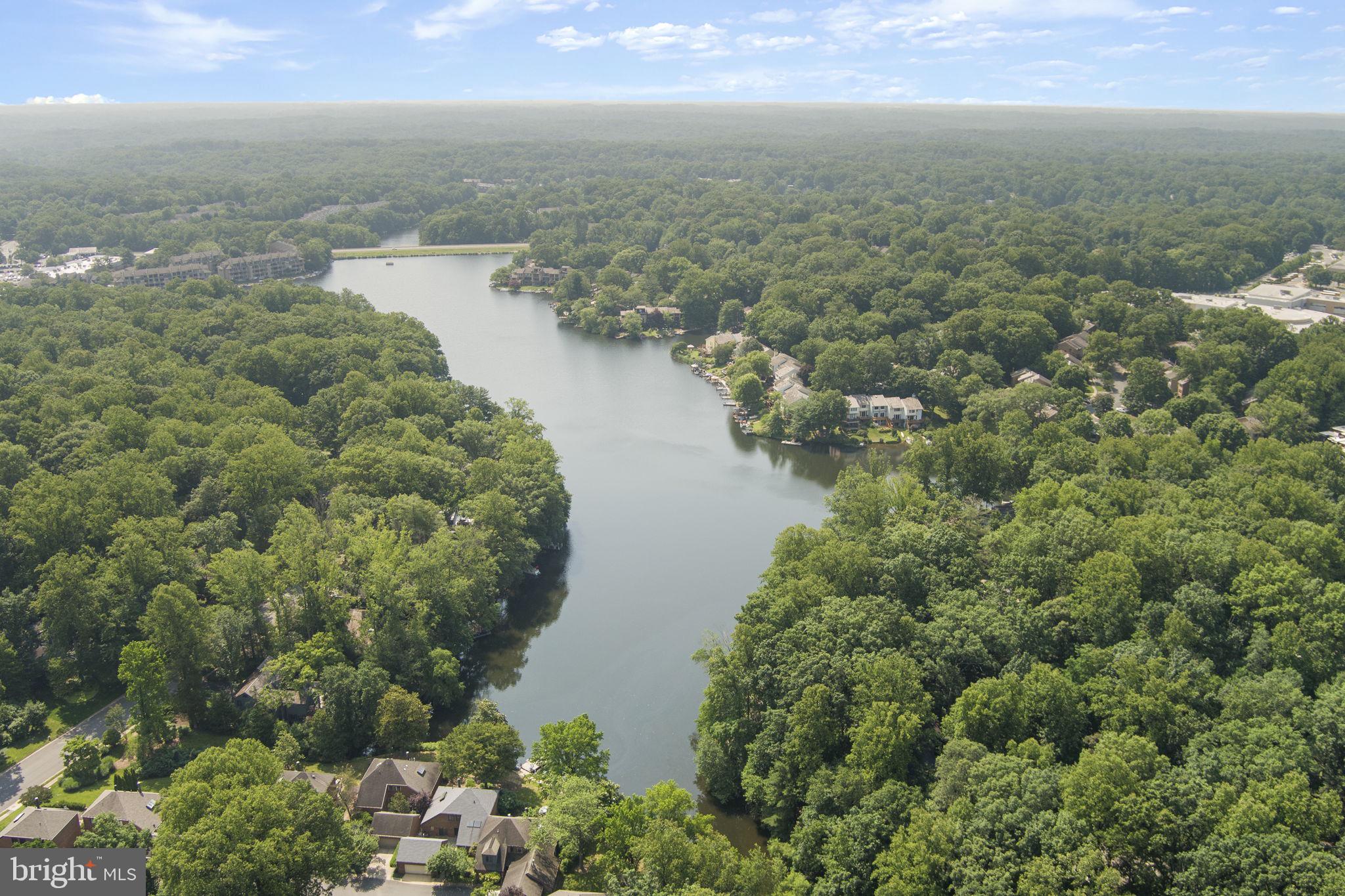 11308 Gatesborough Lane Reston, VA 20191 - Photo 46 of 58 a view of a lake with a city