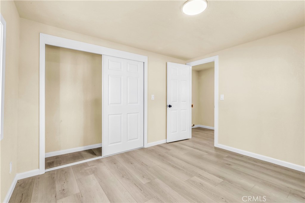 15905 Kugelman Street Lower Lake, CA 95457 - Photo 26 of 75 a view of an empty room with wooden floor