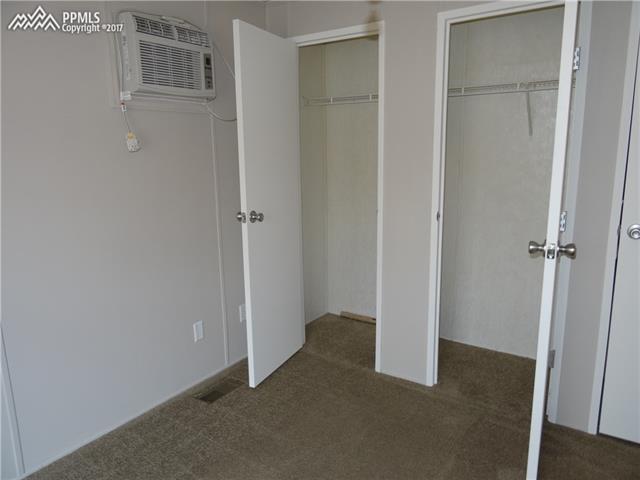 3405 Sinton Road, Unit 233 Colorado Springs, CO 80907 - Photo 12 of 22 A look into the master closets