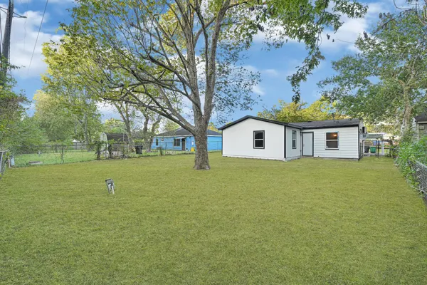 a view of a house with a big yard