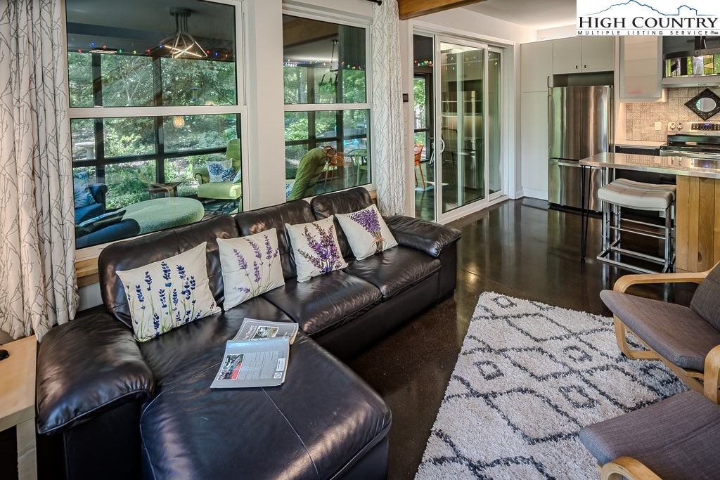 314 Hillandale Drive Boone, NC 28607 - Photo 12 of 49 a living room with furniture and a large window