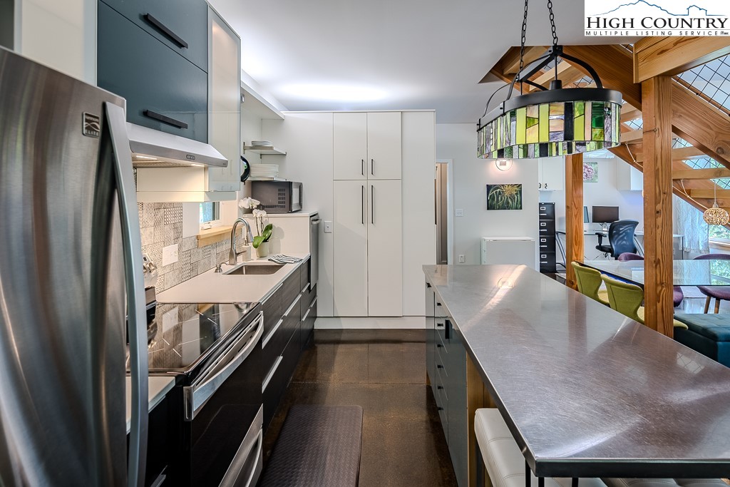 314 Hillandale Drive Boone, NC 28607 - Photo 15 of 49 a kitchen with stainless steel appliances granite countertop a refrigerator a stove and a sink