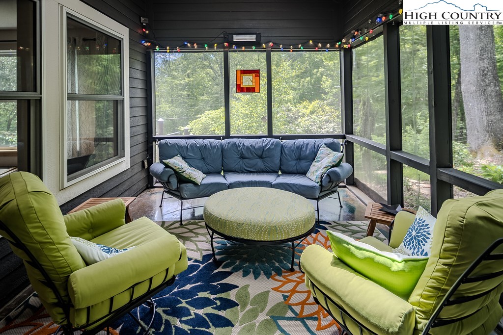 314 Hillandale Drive Boone, NC 28607 - Photo 20 of 49 a living room with furniture and a large window