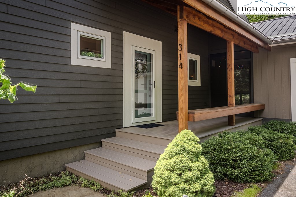 314 Hillandale Drive Boone, NC 28607 - Photo 2 of 49 a view of a pathway besides a house