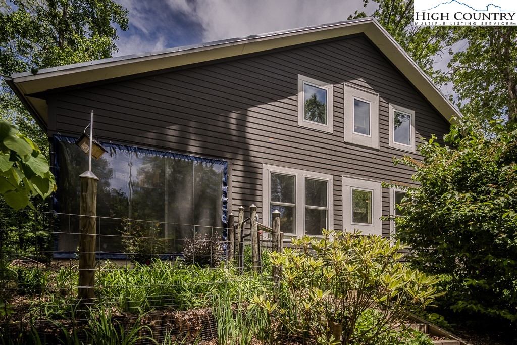 314 Hillandale Drive Boone, NC 28607 - Photo 23 of 49 a backyard of a house with lots of green space