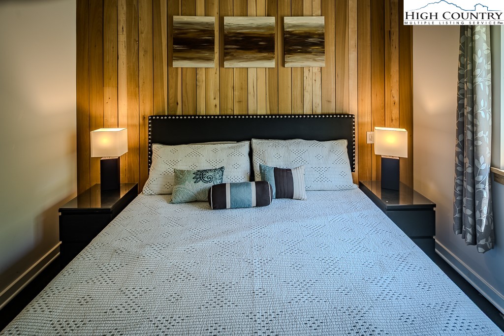 314 Hillandale Drive Boone, NC 28607 - Photo 26 of 49 a bedroom with a bed and window