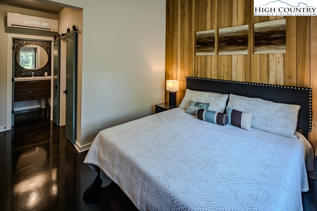 314 Hillandale Drive Boone, NC 28607 - Photo 27 of 49 a bedroom with a bed and a window