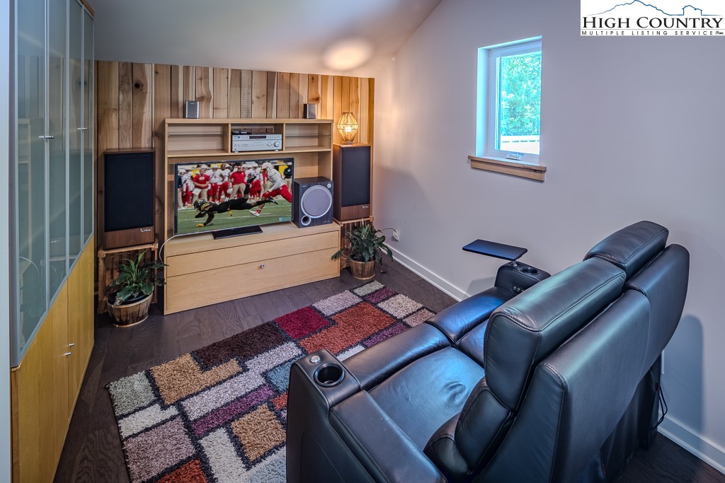 314 Hillandale Drive Boone, NC 28607 - Photo 34 of 49 a living room with furniture a flat screen tv and a window