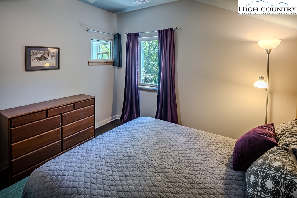 314 Hillandale Drive Boone, NC 28607 - Photo 38 of 49 a bedroom with a bed and a window