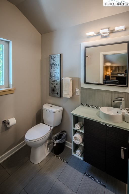 314 Hillandale Drive Boone, NC 28607 - Photo 40 of 49 a bathroom with a toilet sink and mirror