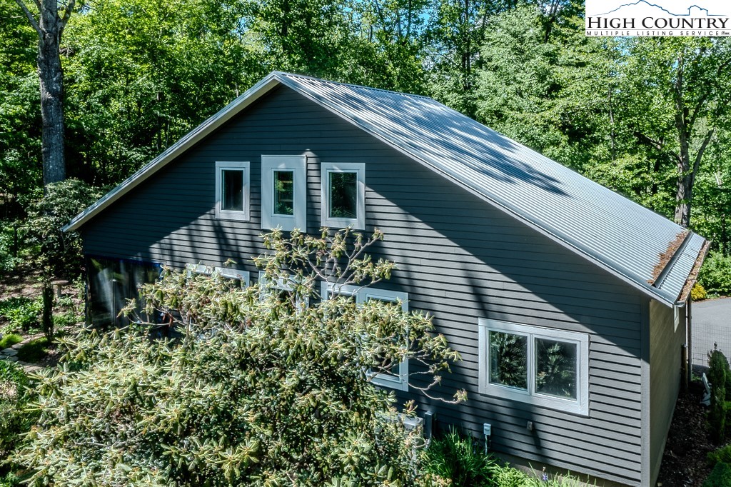 314 Hillandale Drive Boone, NC 28607 - Photo 49 of 49 a house with trees in the background
